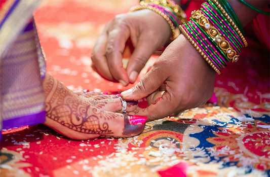 Buubs - wearing the ring on bride's toe finger, traditional Indian  wedding ritual during Hindu marriage ceremony